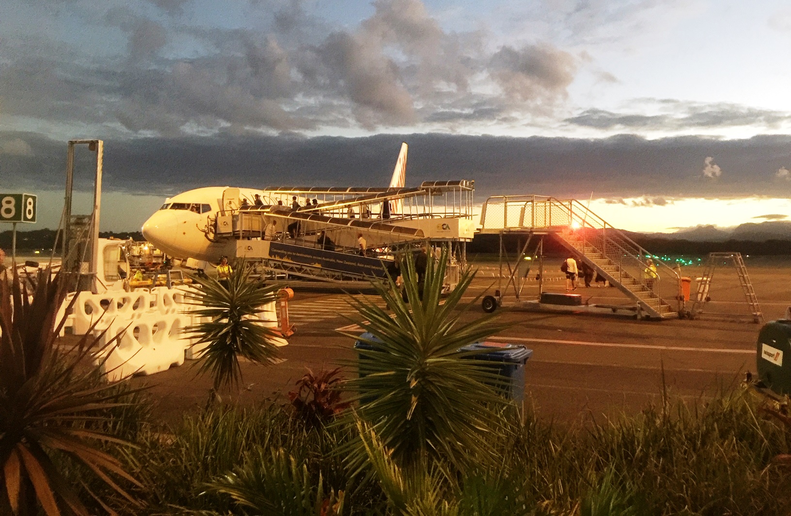 People getting on the plane